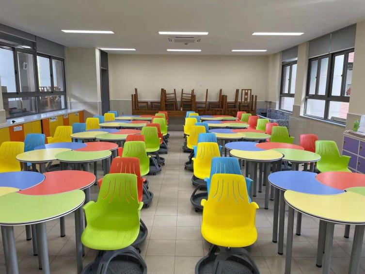 The "Rainbow Spinner" Chair: Where Learning Meets Play!
